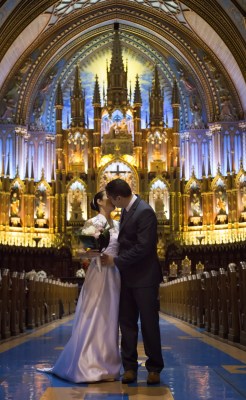 bride & groom kissing in church