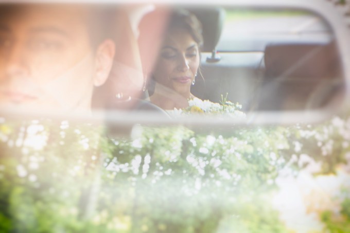bride driving to church rearview mirror reflection