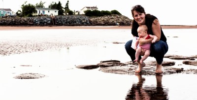mom and baby on the beach